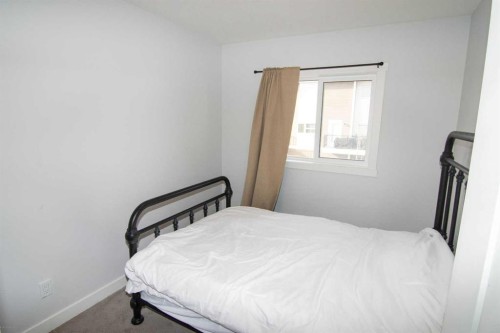 62 Walden Lane Se, Calgary, AB - Indoor Photo Showing Bedroom