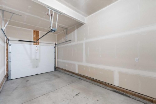 62 Walden Lane Se, Calgary, AB - Indoor Photo Showing Garage