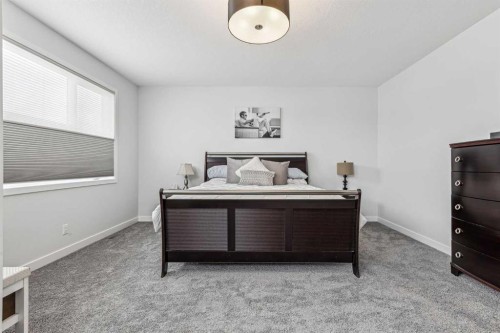 123 Mitchell Way Nw, Calgary, AB - Indoor Photo Showing Bedroom