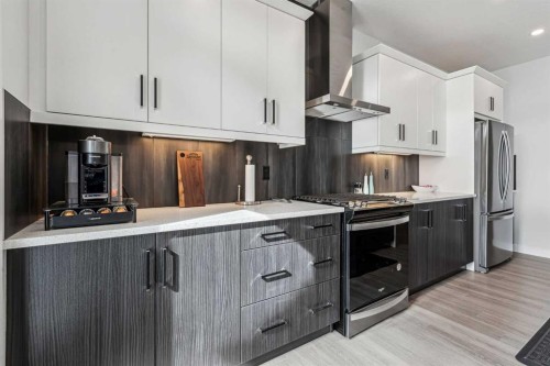 123 Mitchell Way Nw, Calgary, AB - Indoor Photo Showing Kitchen With Stainless Steel Kitchen With Upgraded Kitchen