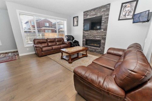73 Redstone Link Ne, Calgary, AB - Indoor Photo Showing Living Room With Fireplace
