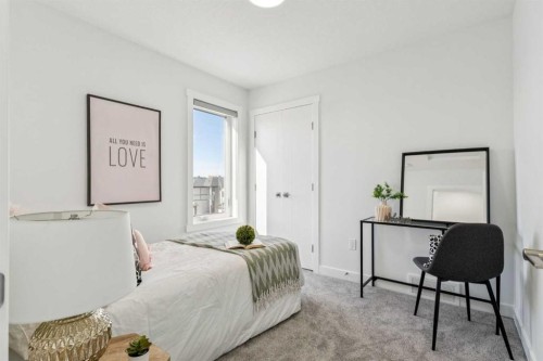 205-95 Saddlecrest Circle Ne, Calgary, AB - Indoor Photo Showing Bedroom