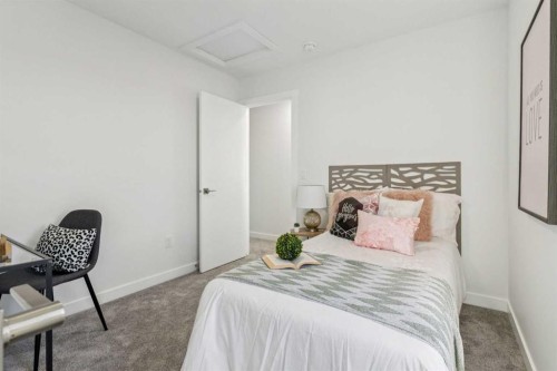 205-95 Saddlecrest Circle Ne, Calgary, AB - Indoor Photo Showing Bedroom