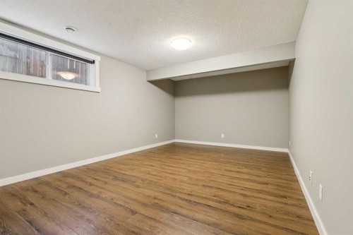 327 Panamount Point Nw, Calgary, AB - Indoor Photo Showing Other Room