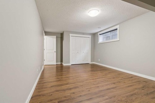 327 Panamount Point Nw, Calgary, AB - Indoor Photo Showing Other Room