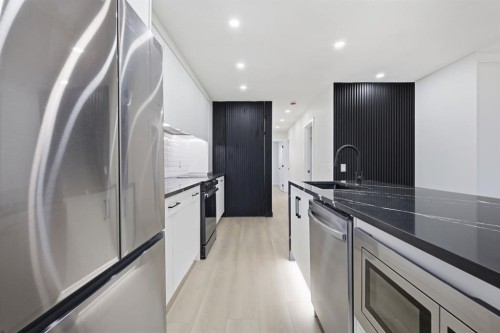 8426 Berkley Road Nw, Calgary, AB - Indoor Photo Showing Kitchen With Stainless Steel Kitchen With Upgraded Kitchen