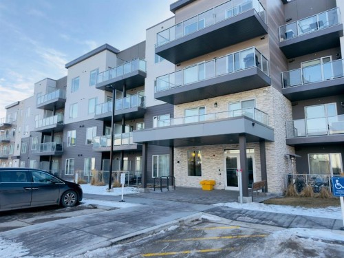 404-200 Shawnee Square Sw, Calgary, AB - Outdoor With Facade