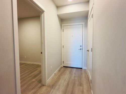 404-200 Shawnee Square Sw, Calgary, AB - Indoor Photo Showing Other Room