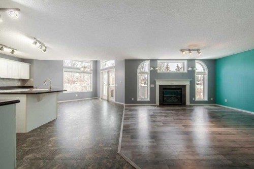 6 Lansing Close, Spruce Grove, AB - Indoor Photo Showing Living Room With Fireplace