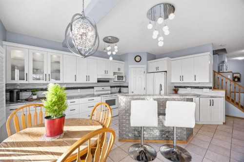 244 Oakmere Place, Chestermere, AB - Indoor Photo Showing Dining Room