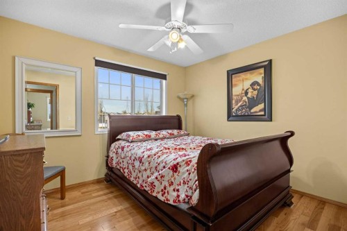 244 Oakmere Place, Chestermere, AB - Indoor Photo Showing Bedroom