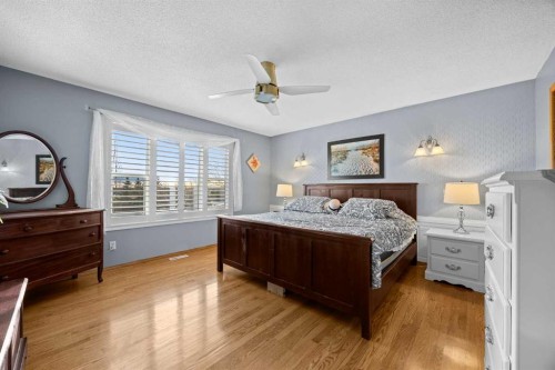 244 Oakmere Place, Chestermere, AB - Indoor Photo Showing Bedroom