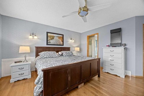 244 Oakmere Place, Chestermere, AB - Indoor Photo Showing Bedroom
