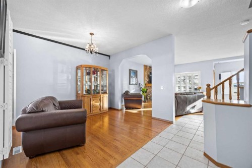 244 Oakmere Place, Chestermere, AB - Indoor Photo Showing Living Room