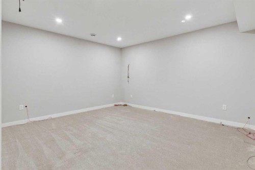 171 Kinniburgh Road, Chestermere, AB - Indoor Photo Showing Other Room