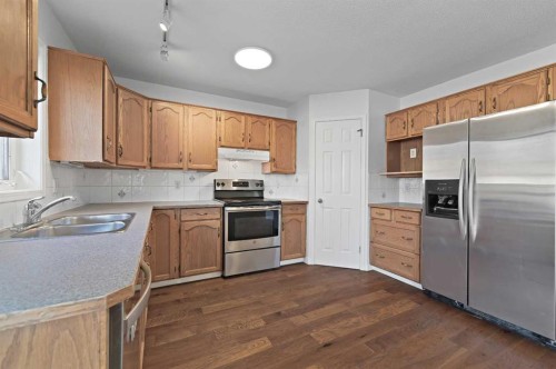 182 Coventry Close Ne, Calgary, AB - Indoor Photo Showing Kitchen With Double Sink