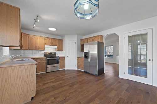 182 Coventry Close Ne, Calgary, AB - Indoor Photo Showing Kitchen With Double Sink