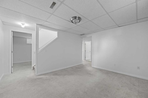 182 Coventry Close Ne, Calgary, AB - Indoor Photo Showing Other Room