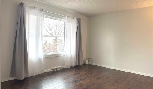 3229 19 Avenue Se, Calgary, AB - Indoor Photo Showing Other Room