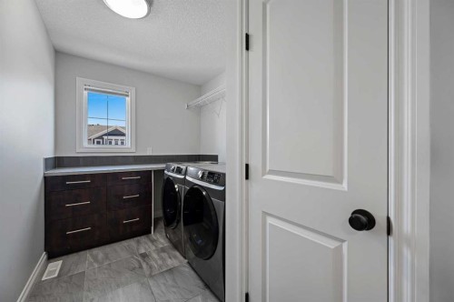 193 Evansridge View Nw, Calgary, AB - Indoor Photo Showing Laundry Room