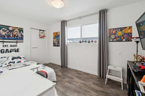 65 Tararidge Close Ne, Calgary, AB - Indoor Photo Showing Bedroom