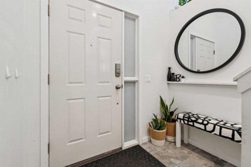 65 Tararidge Close Ne, Calgary, AB - Indoor Photo Showing Other Room