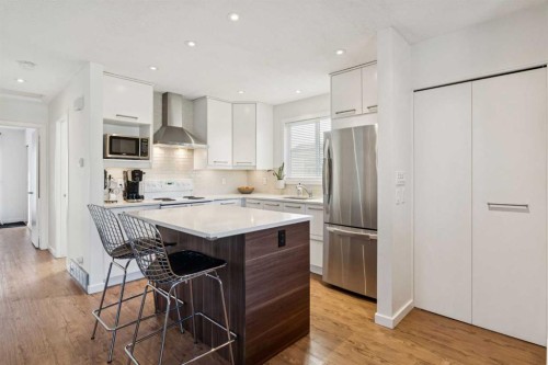 65 Tararidge Close Ne, Calgary, AB - Indoor Photo Showing Kitchen With Upgraded Kitchen