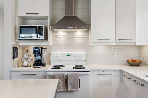 65 Tararidge Close Ne, Calgary, AB - Indoor Photo Showing Kitchen