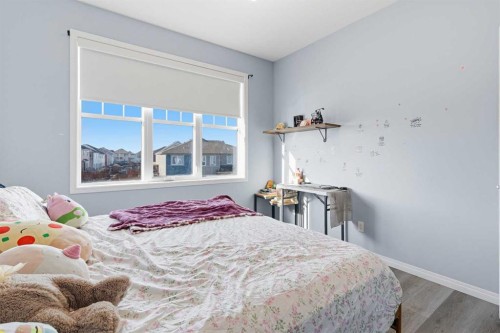 237 Windrow Crescent Sw, Airdrie, AB - Indoor Photo Showing Bedroom