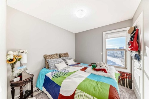 102-32 Horseshoe Crescent, Cochrane, AB - Indoor Photo Showing Bedroom