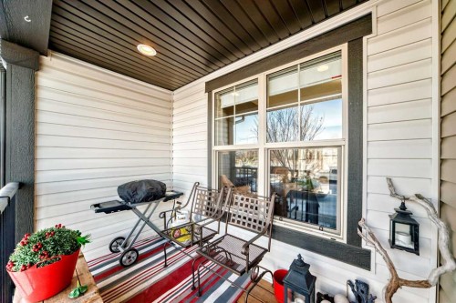102-32 Horseshoe Crescent, Cochrane, AB - Outdoor With Deck Patio Veranda With Exterior