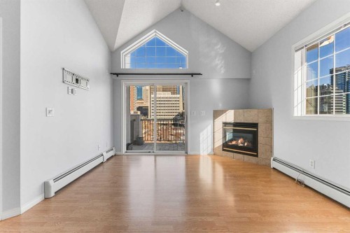 518-126 14 Avenue Sw, Calgary, AB - Indoor With Fireplace