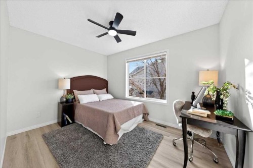 11 Copperfield Court Se, Calgary, AB - Indoor Photo Showing Bedroom