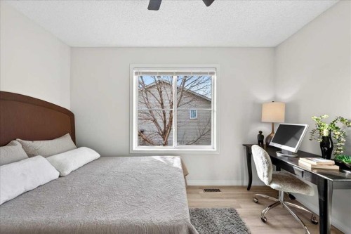 11 Copperfield Court Se, Calgary, AB - Indoor Photo Showing Bedroom