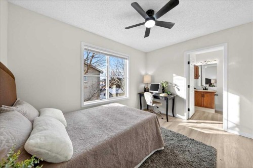 11 Copperfield Court Se, Calgary, AB - Indoor Photo Showing Bedroom