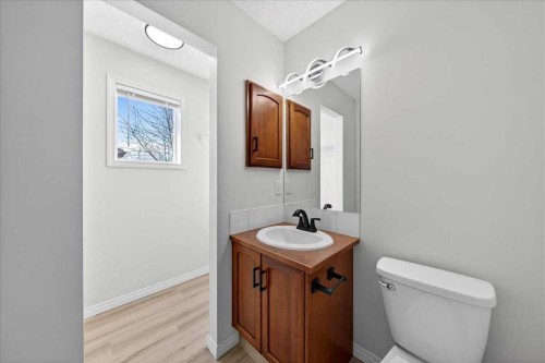 11 Copperfield Court Se, Calgary, AB - Indoor Photo Showing Bathroom