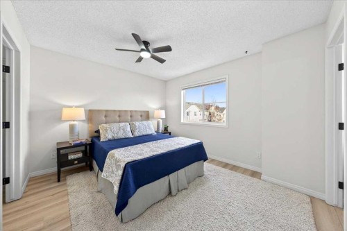 11 Copperfield Court Se, Calgary, AB - Indoor Photo Showing Bedroom