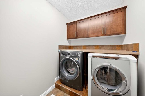 21 Panamount Street Nw, Calgary, AB - Indoor Photo Showing Laundry Room