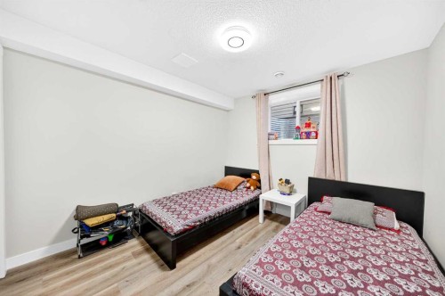 21 Panamount Street Nw, Calgary, AB - Indoor Photo Showing Bedroom