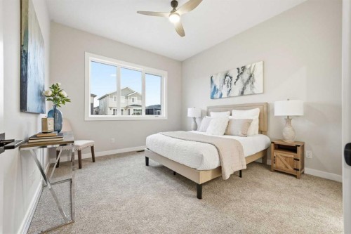 108 Quartz Crescent, Cochrane, AB - Indoor Photo Showing Bedroom