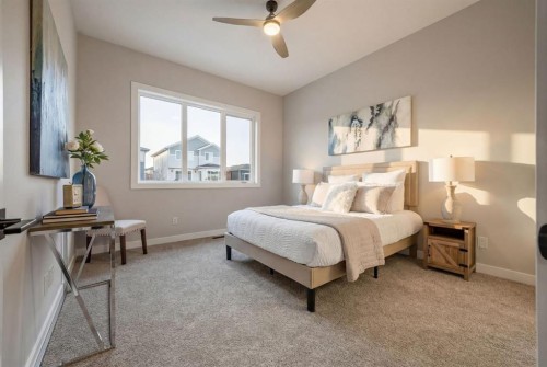 108 Quartz Crescent, Cochrane, AB - Indoor Photo Showing Bedroom