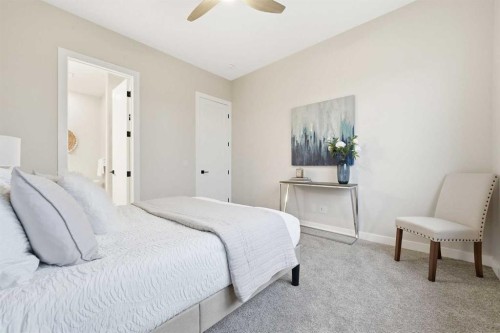 108 Quartz Crescent, Cochrane, AB - Indoor Photo Showing Bedroom