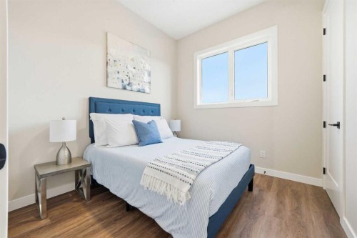 108 Quartz Crescent, Cochrane, AB - Indoor Photo Showing Bedroom