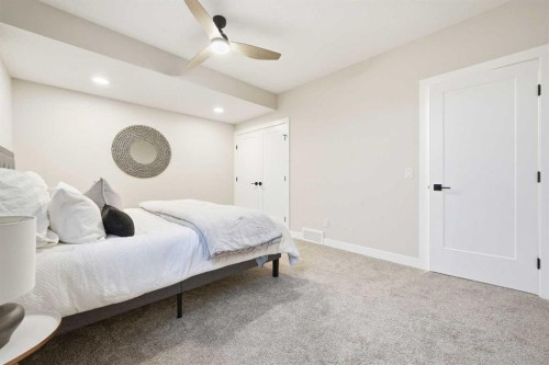 108 Quartz Crescent, Cochrane, AB - Indoor Photo Showing Bedroom