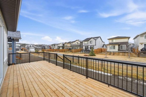 108 Quartz Crescent, Cochrane, AB - Outdoor With Deck Patio Veranda With Exterior