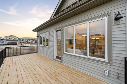 108 Quartz Crescent, Cochrane, AB - Outdoor With Deck Patio Veranda With Exterior
