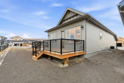 108 Quartz Crescent, Cochrane, AB - Outdoor With Deck Patio Veranda With Exterior