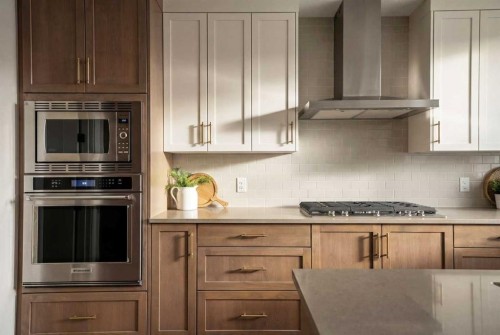 108 Quartz Crescent, Cochrane, AB - Indoor Photo Showing Kitchen With Upgraded Kitchen