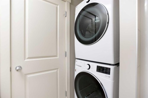 62 Panamount Road Nw, Calgary, AB - Indoor Photo Showing Laundry Room