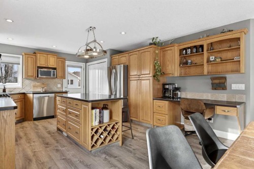 951 3Rd Street Sw, Diamond Valley, AB - Indoor Photo Showing Kitchen With Stainless Steel Kitchen